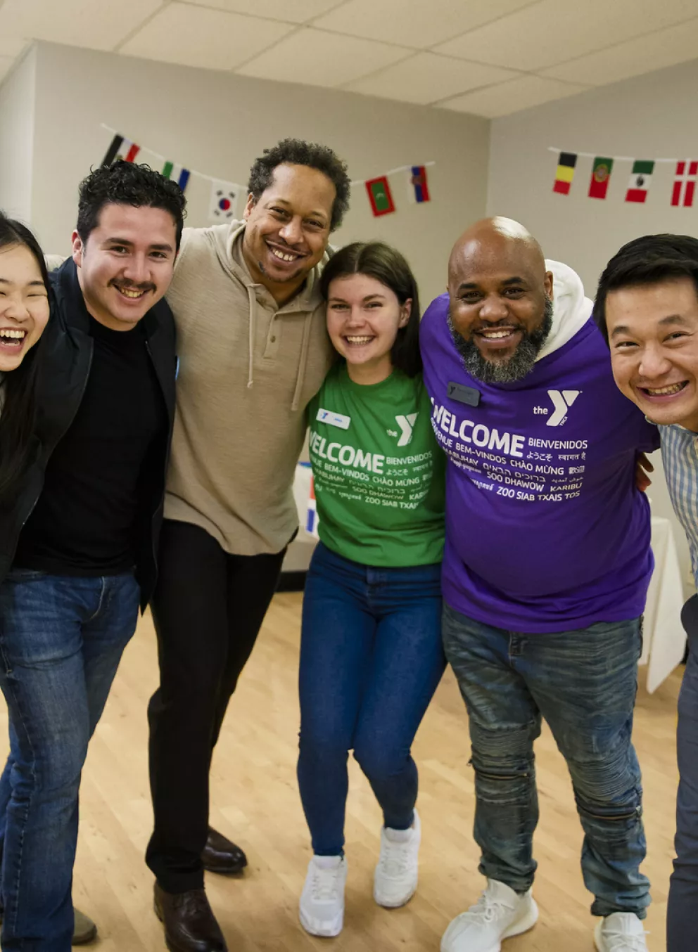 multicultural staff together smiling